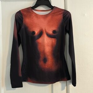 Woman novelty top. Marked size large but fits like a medium.